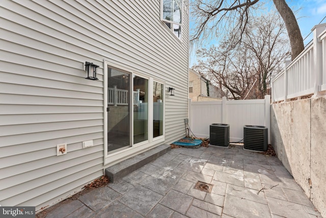 view of patio featuring central air condition unit