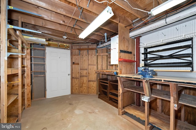 basement with a workshop area