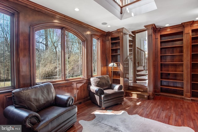 7024 Green Oak Dr, Mclean, VA 22101 - sitting room with stairway, crown molding, hardwood / wood-style floors, a skylight, and recessed lighting