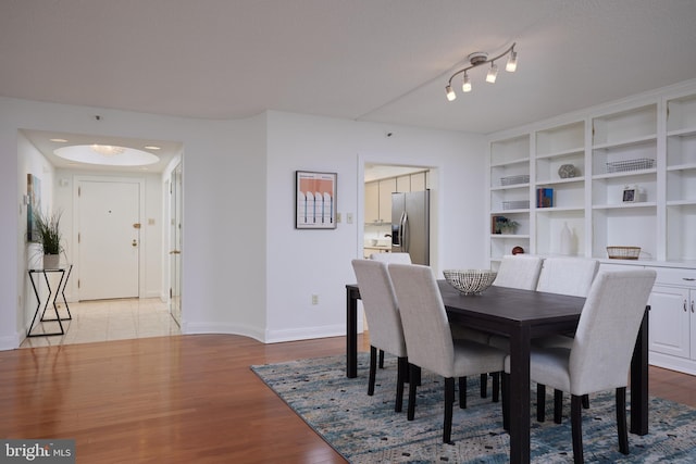 dining room featuring light hardwood / wood-style flooring