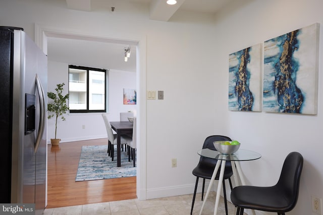 dining area with light hardwood / wood-style flooring