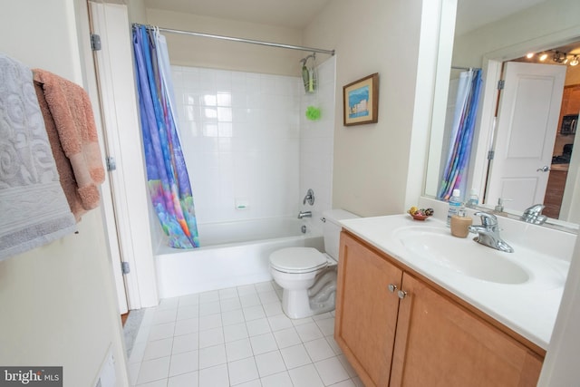 full bathroom with vanity, shower / tub combo with curtain, tile patterned floors, and toilet