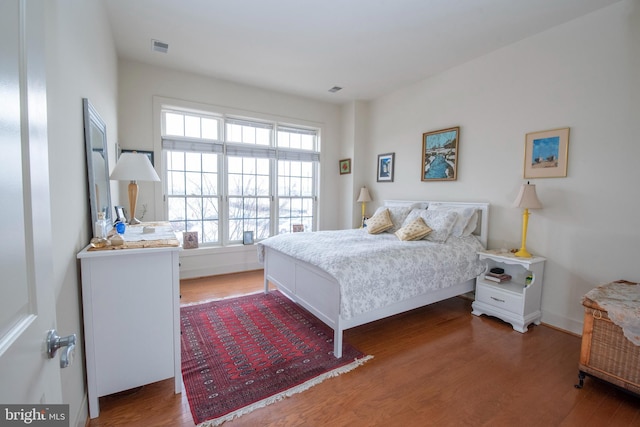 bedroom featuring hardwood / wood-style flooring