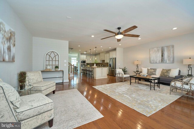 7916 Culloden Crest Ln, Gainesville, VA 20155 - living area with dark wood-style flooring, ceiling fan, and recessed lighting