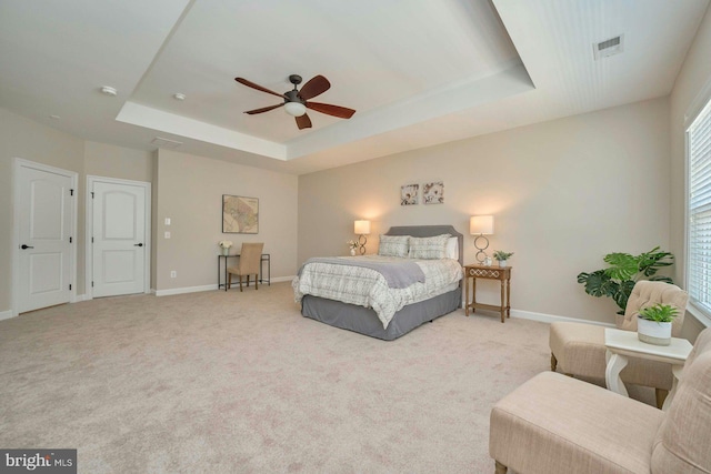 7916 Culloden Crest Ln, Gainesville, VA 20155 - bedroom featuring a raised ceiling, light colored carpet, and ceiling fan