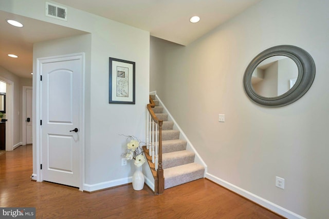 7916 Culloden Crest Ln, Gainesville, VA 20155 - staircase with wood finished floors and recessed lighting