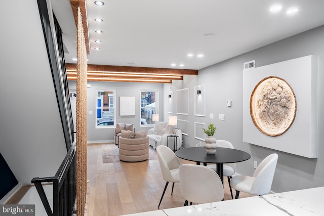 dining area with light wood-type flooring