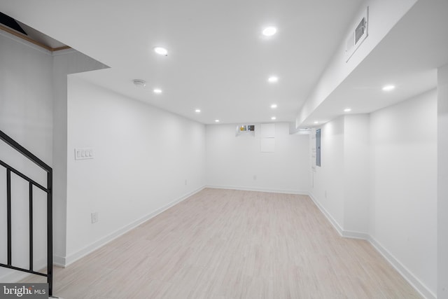 basement with light wood-type flooring