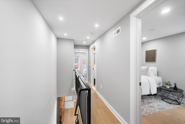 hallway featuring light hardwood / wood-style floors