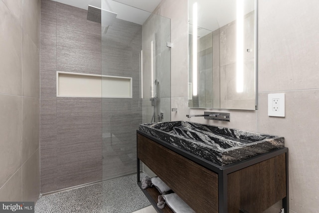 bathroom featuring vanity and walk in shower