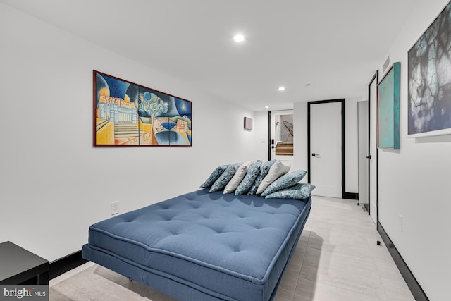 bedroom with recessed lighting and baseboards