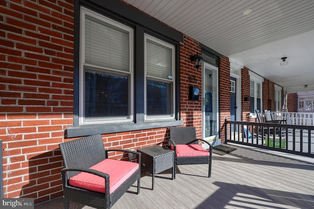 wooden terrace with covered porch