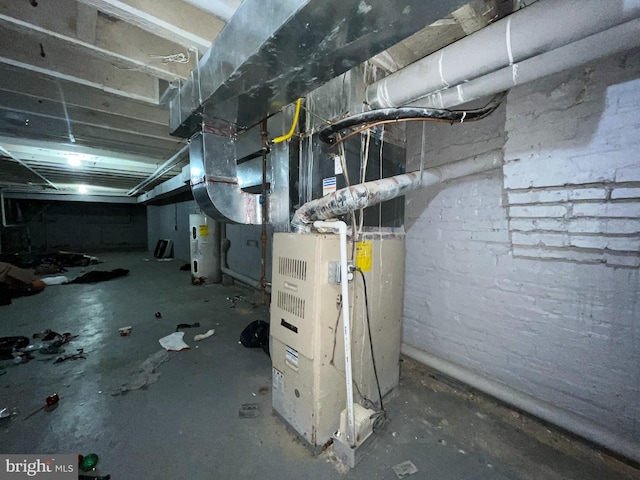 basement with heating unit and water heater