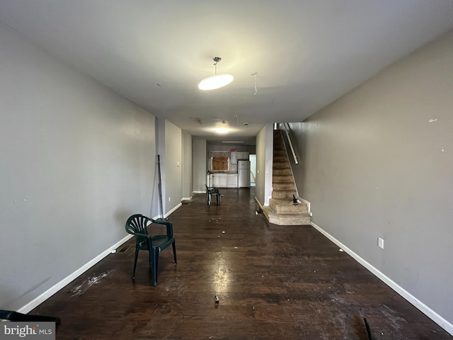 hallway featuring dark hardwood / wood-style floors