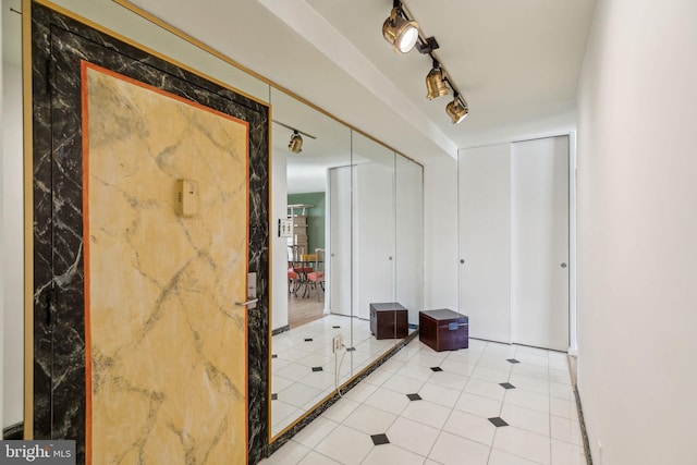 bathroom featuring track lighting