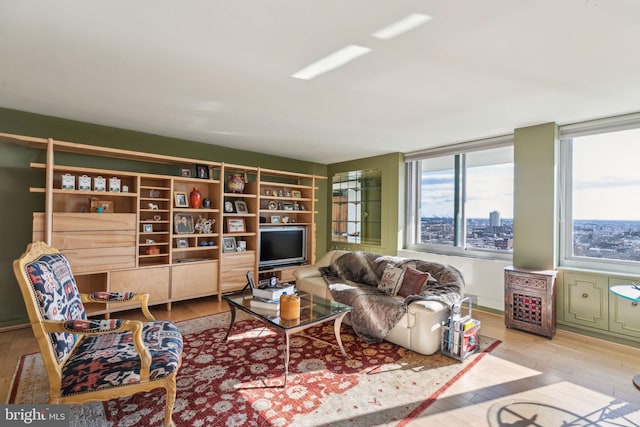 living room with light hardwood / wood-style floors