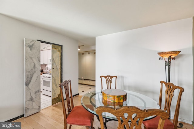 dining room featuring light wood-type flooring