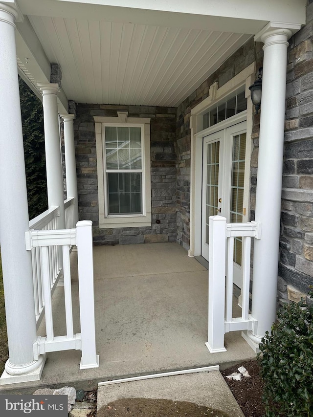 view of patio featuring french doors