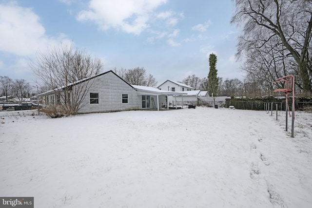 65 Pageant Ln, Willingboro, NJ 08046 - yard covered in snow featuring fence