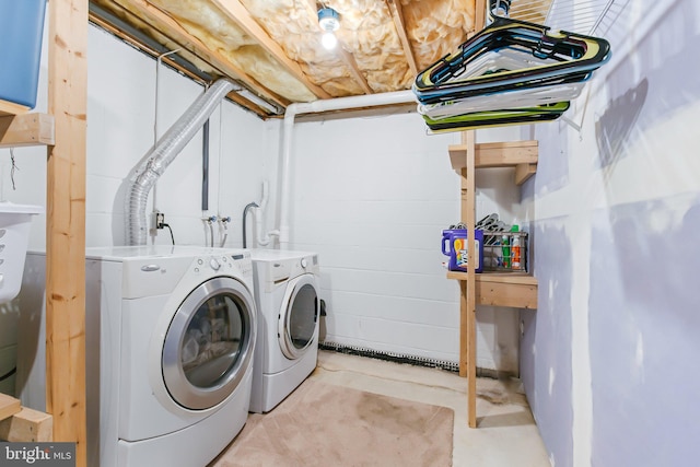 laundry area featuring laundry area and washing machine and clothes dryer