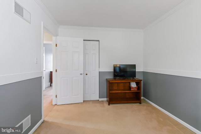 bedroom featuring visible vents, baseboards, carpet, and ornamental molding