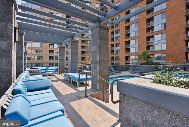 view of patio featuring a pergola and outdoor lounge area