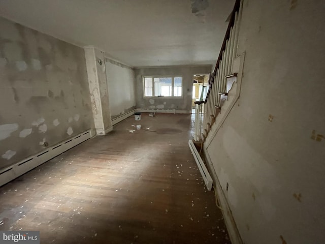 miscellaneous room featuring a baseboard heating unit