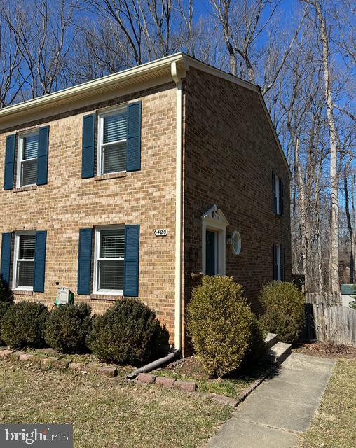 view of front of property with brick siding