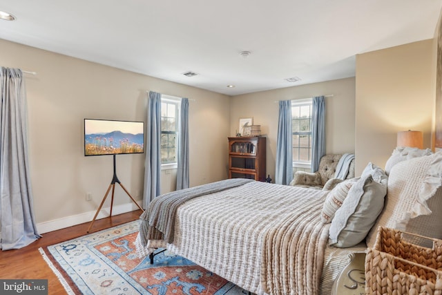 bedroom featuring hardwood / wood-style floors