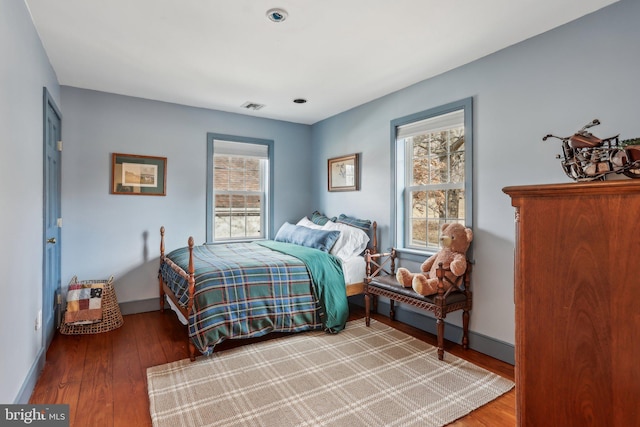 bedroom featuring wood-type flooring