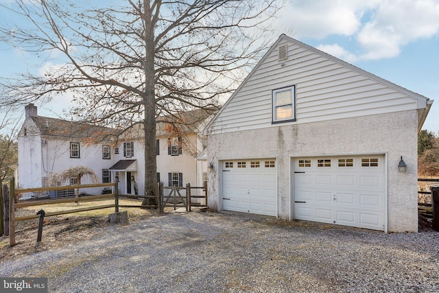 view of property featuring a garage