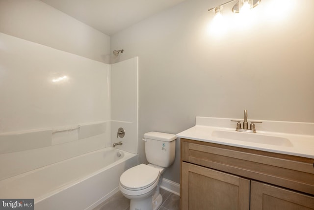 full bath featuring toilet, shower / bath combination, baseboards, and vanity