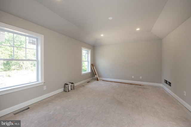 unfurnished room featuring recessed lighting, visible vents, and baseboards