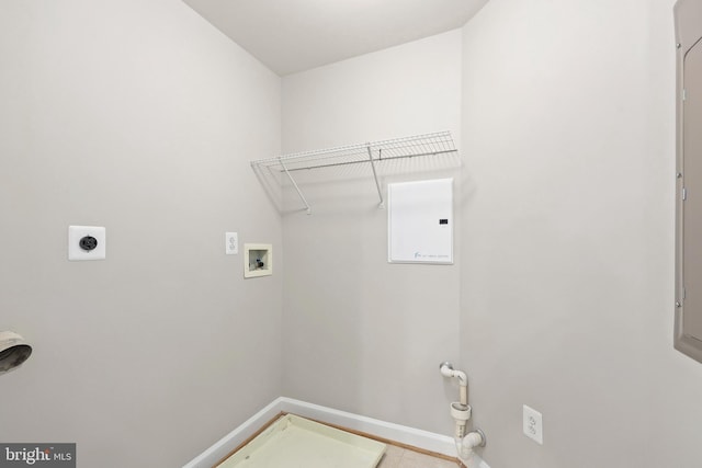 washroom featuring baseboards, laundry area, hookup for a washing machine, and hookup for an electric dryer