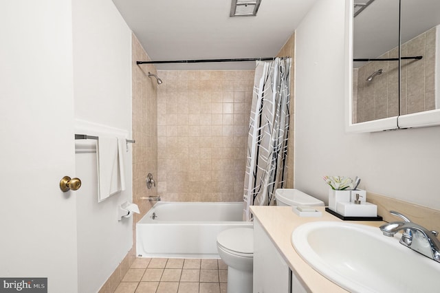 full bathroom featuring shower / tub combo, vanity, toilet, and tile patterned flooring