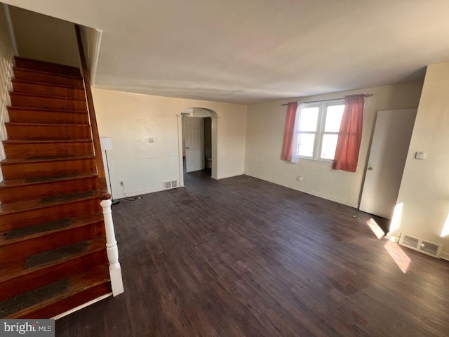 empty room with dark hardwood / wood-style floors