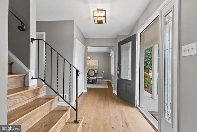 foyer with light wood-type flooring