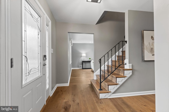 foyer with hardwood / wood-style floors