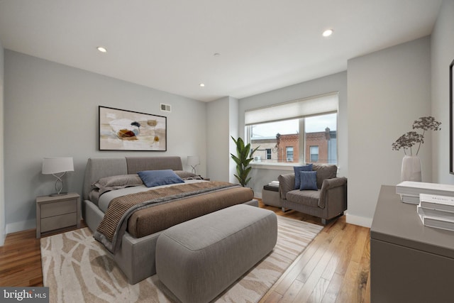 bedroom with light wood-type flooring