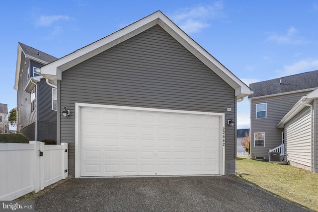 garage with a yard