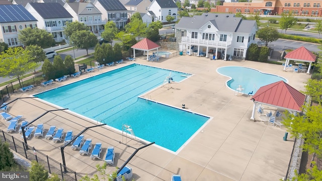 view of swimming pool featuring a patio area and a gazebo