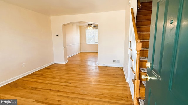 interior space with ceiling fan and light hardwood / wood-style floors