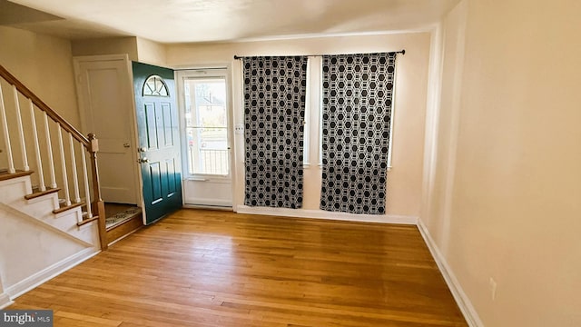 foyer with light hardwood / wood-style floors