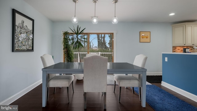 dining room featuring dark wood-type flooring