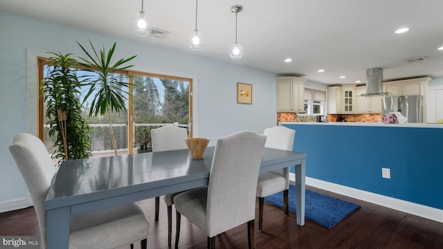 dining room featuring dark wood-type flooring