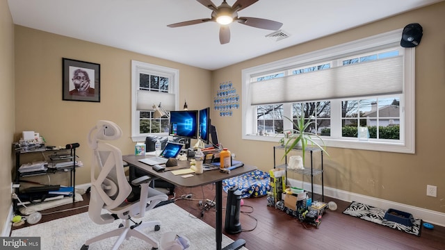 office space featuring wood-type flooring and ceiling fan