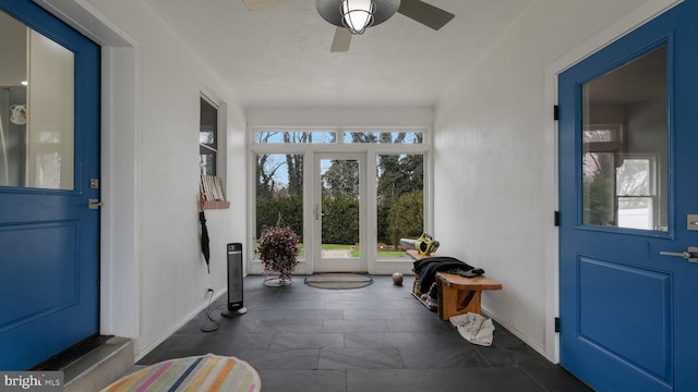 entryway with plenty of natural light and ceiling fan