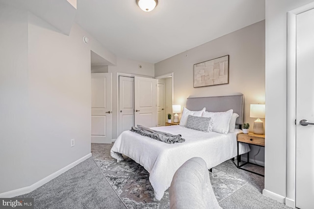 bedroom with a closet and carpet flooring