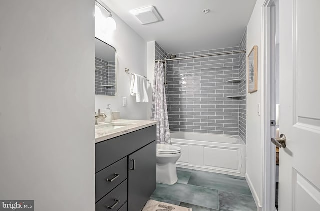 full bathroom with vanity, toilet, and shower / bath combo