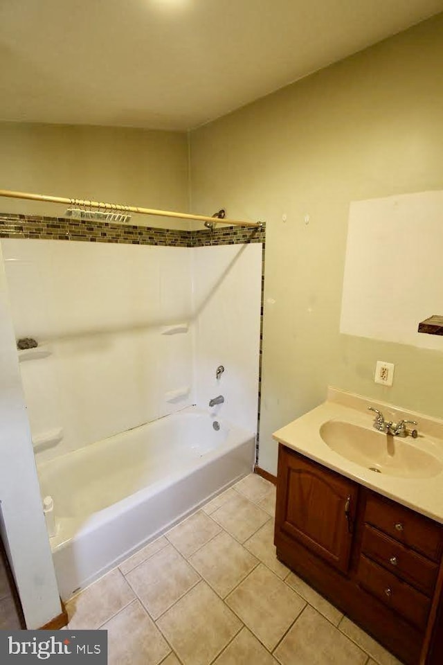 bathroom with vanity, bathtub / shower combination, and tile patterned flooring